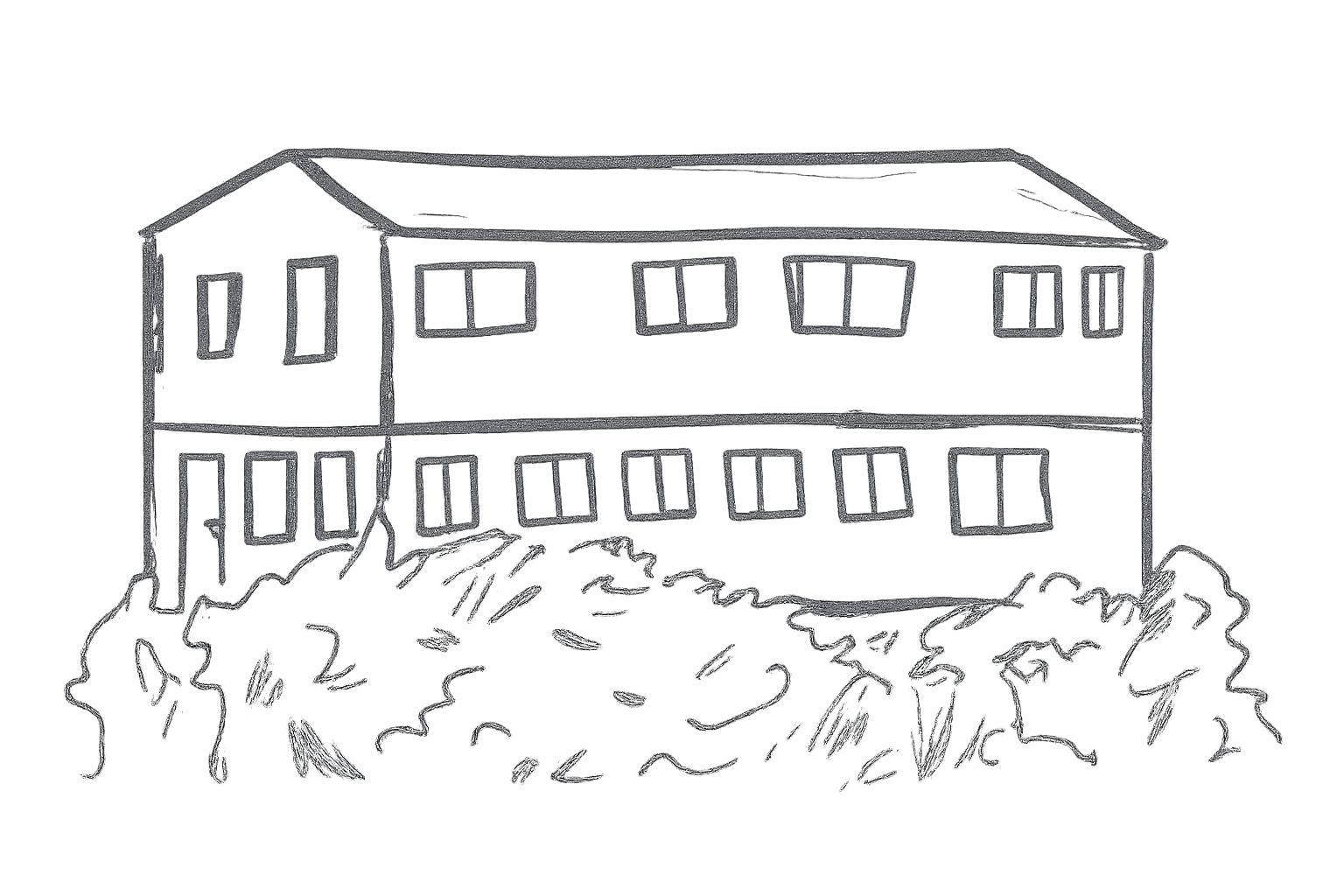 Two-story building with multiple windows, partially obscured by bushes.