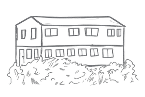 Two-story building with multiple windows, partially obscured by bushes.