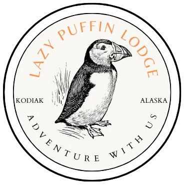 Lazy Puffin Lodge logo: puffin illustration within a circle, text