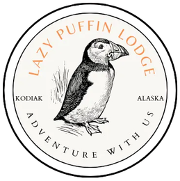 Lazy Puffin Lodge logo: puffin illustration within a circle, text