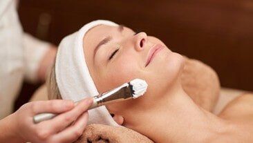 Woman and Cosmetologist in Spa — Facials in Grayslake, IL