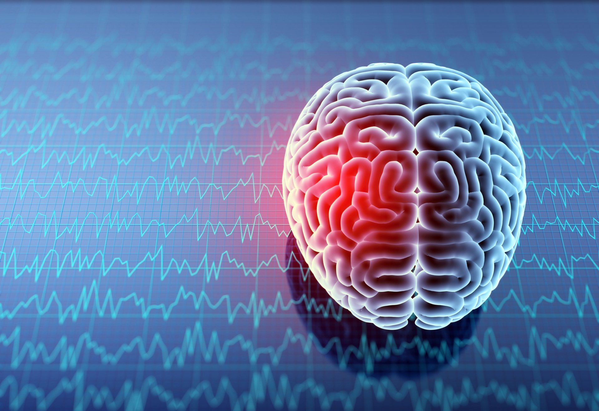 Brain with red highlight, overlaid on blue EEG waves.