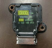 Black Audi S4 ignition coil with green and yellow branding, serial number 058 905 105.
