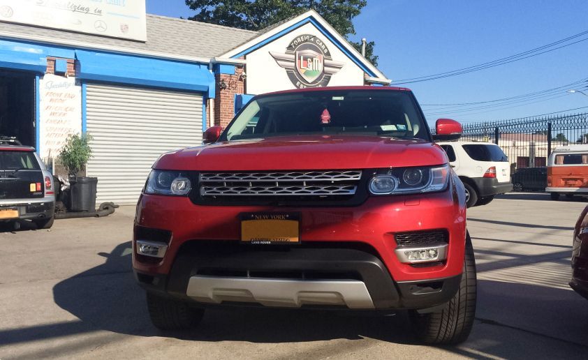 Red car in front of the shop | L & M Foreign Cars