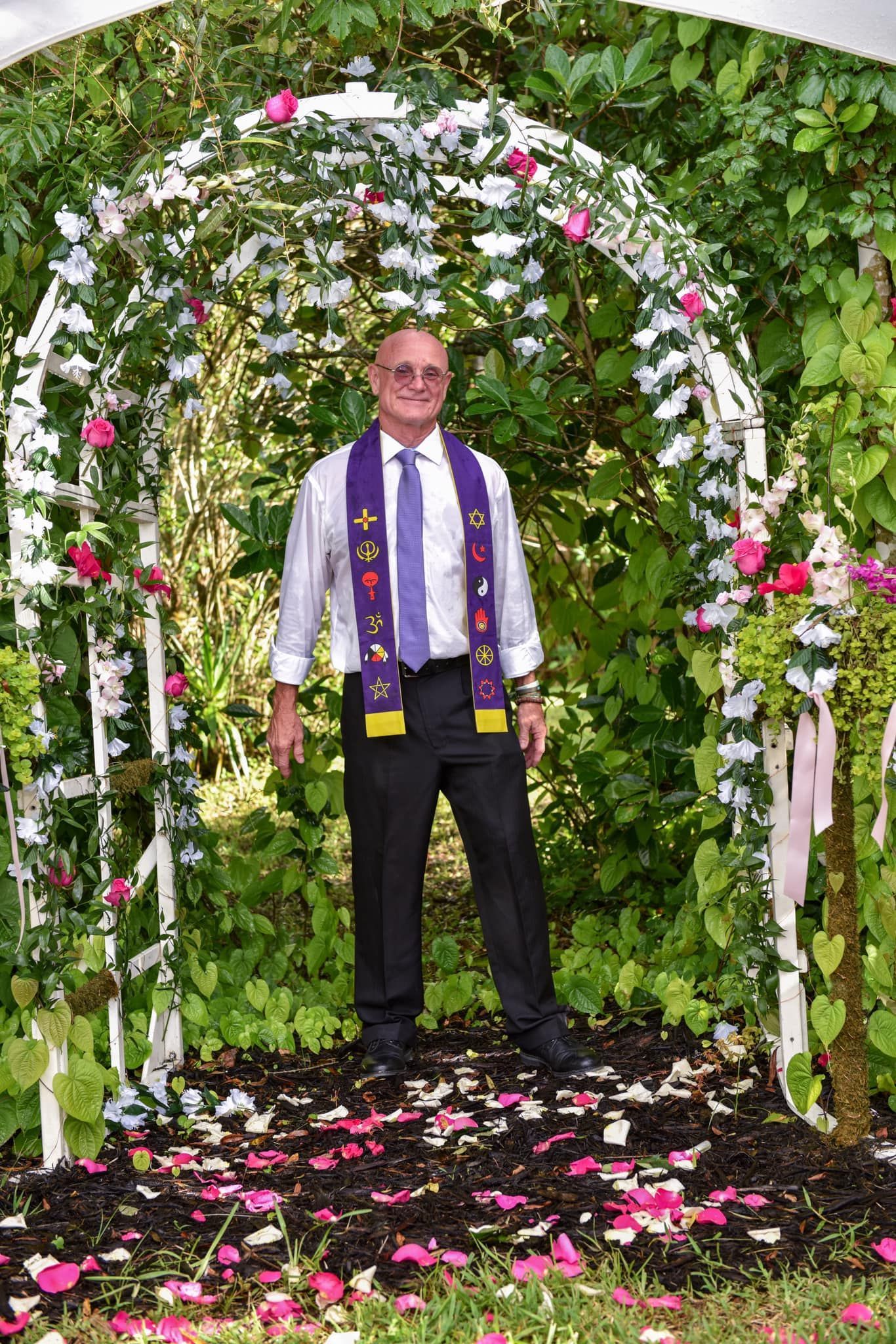 greenery and flowers on wedding altar