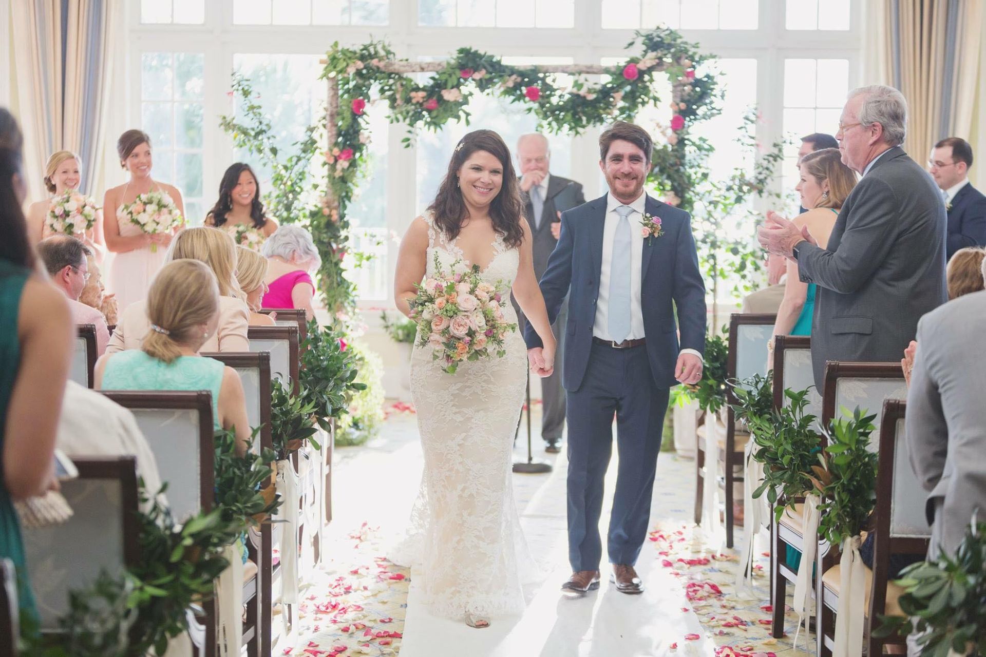 floral garland on wedding arch