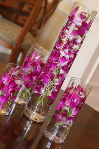 tropical pink flowers in vases