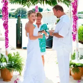 tropical floral garland on wedding arch