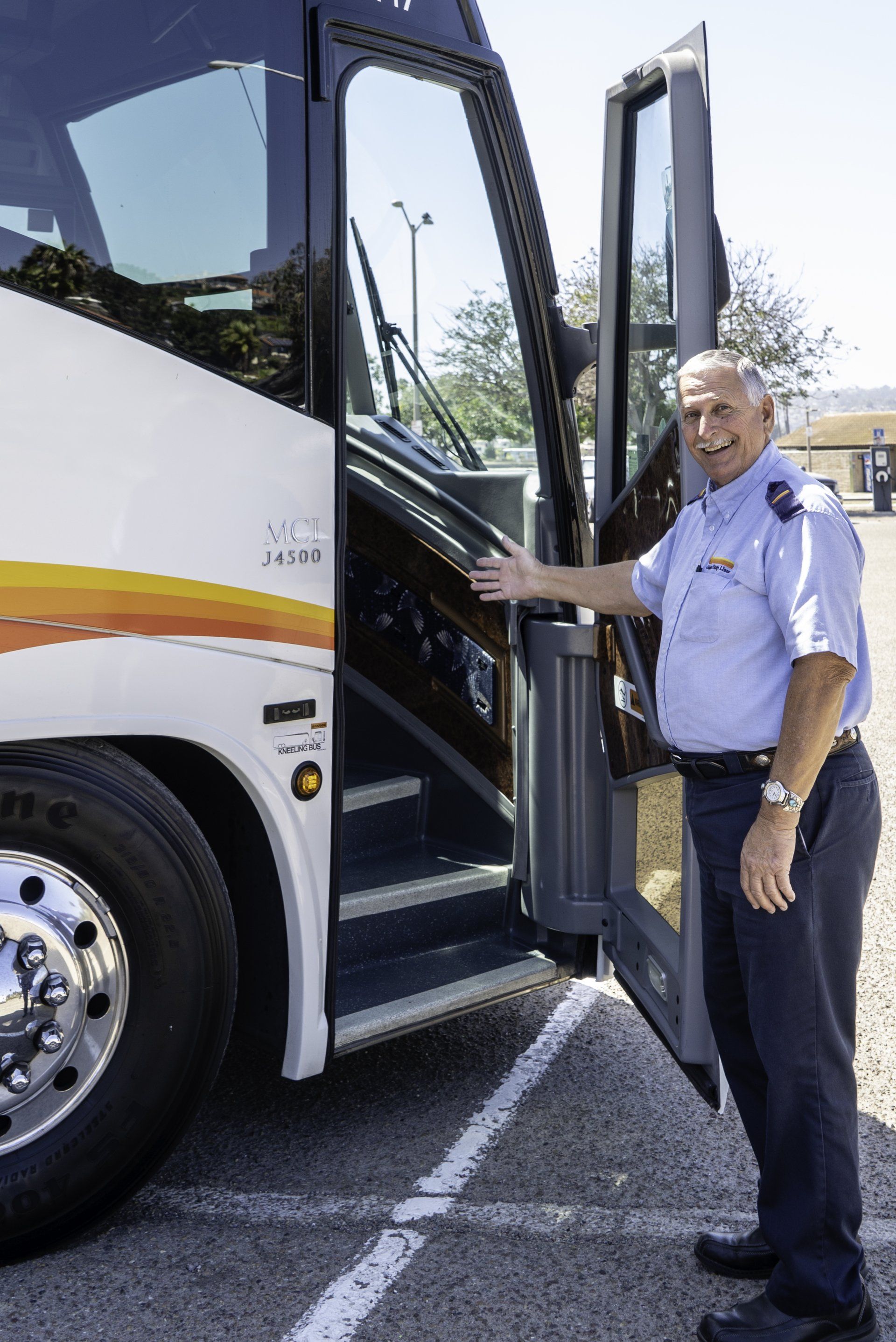 Charter Bus Services — Man Doing Paper Works in San Diego, CA