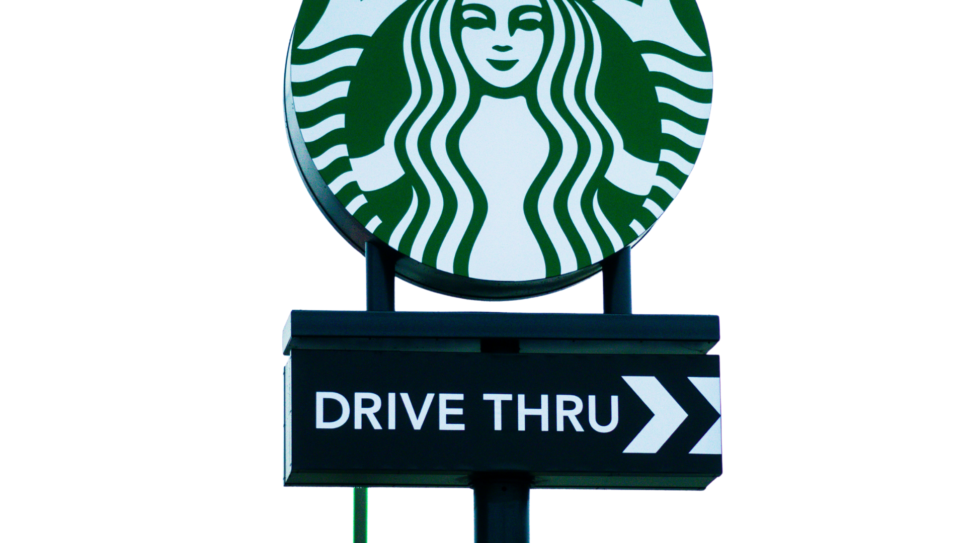 A starbucks logo is on the screen of a cell phone