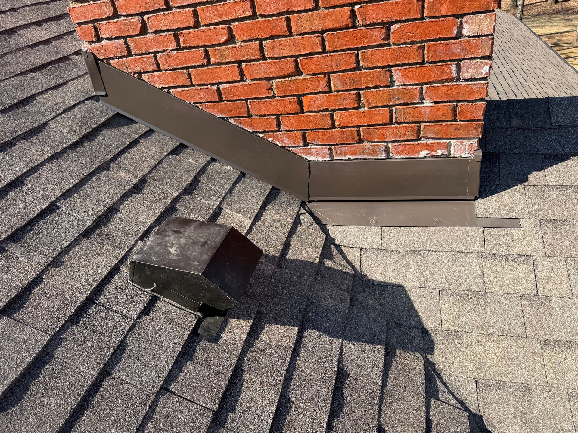 contractors repairing roof