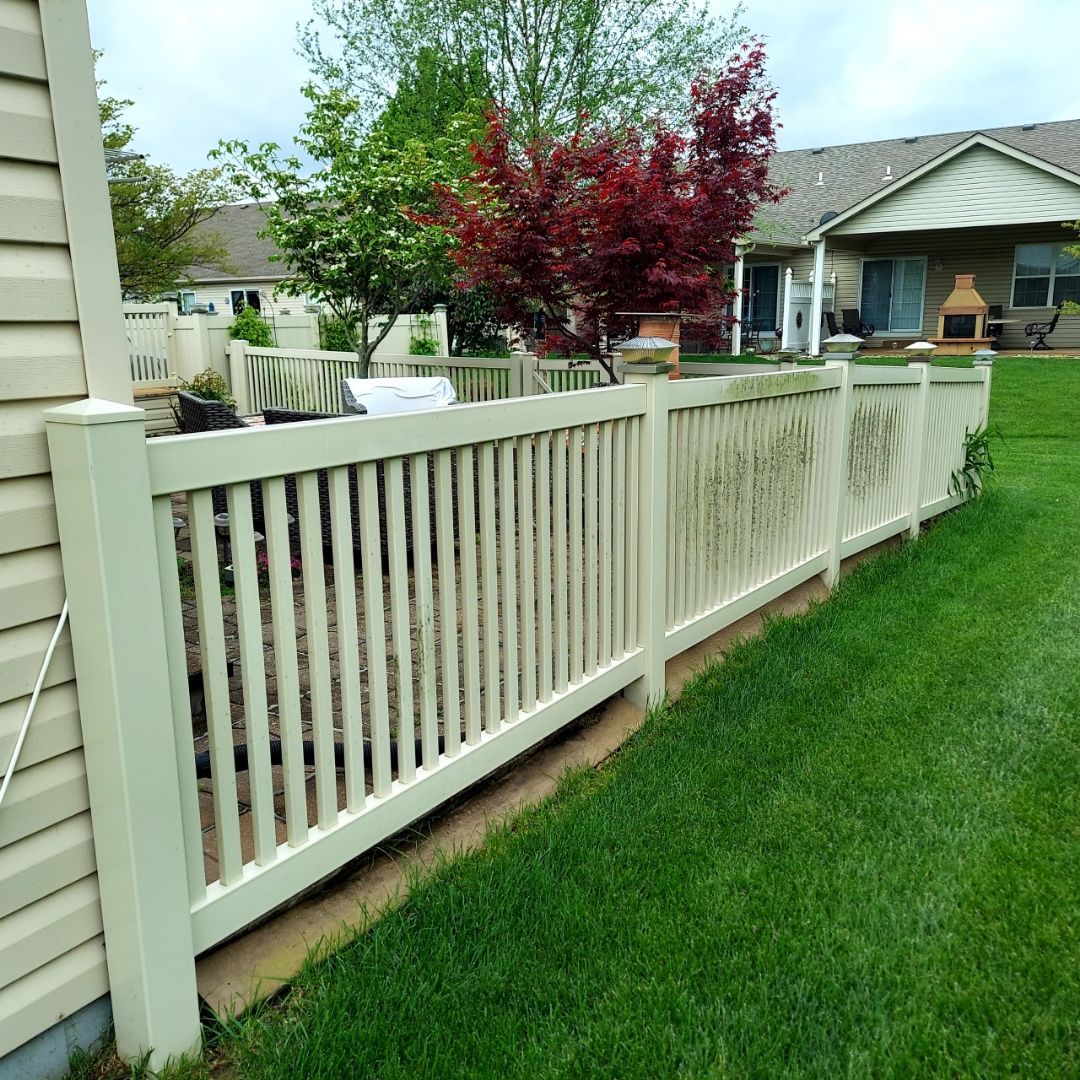 before: algae covered vinyl fence