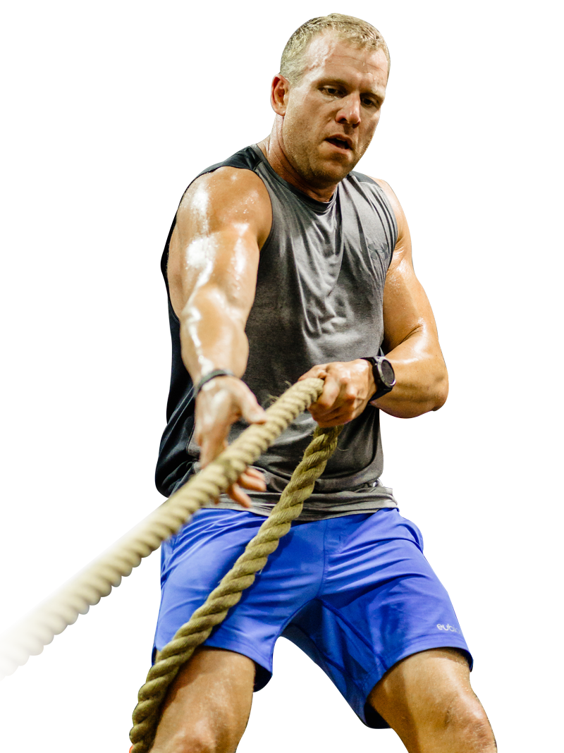 a man pulling a huge rope