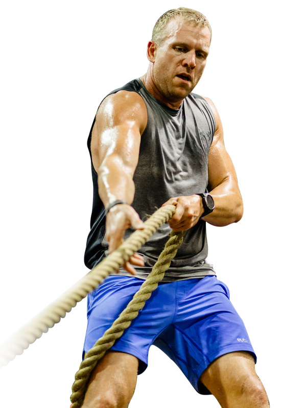 a man pulling a huge rope