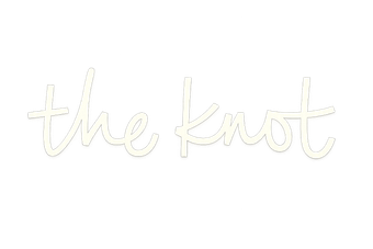 White cursive text reading “the knot” on a plain white background