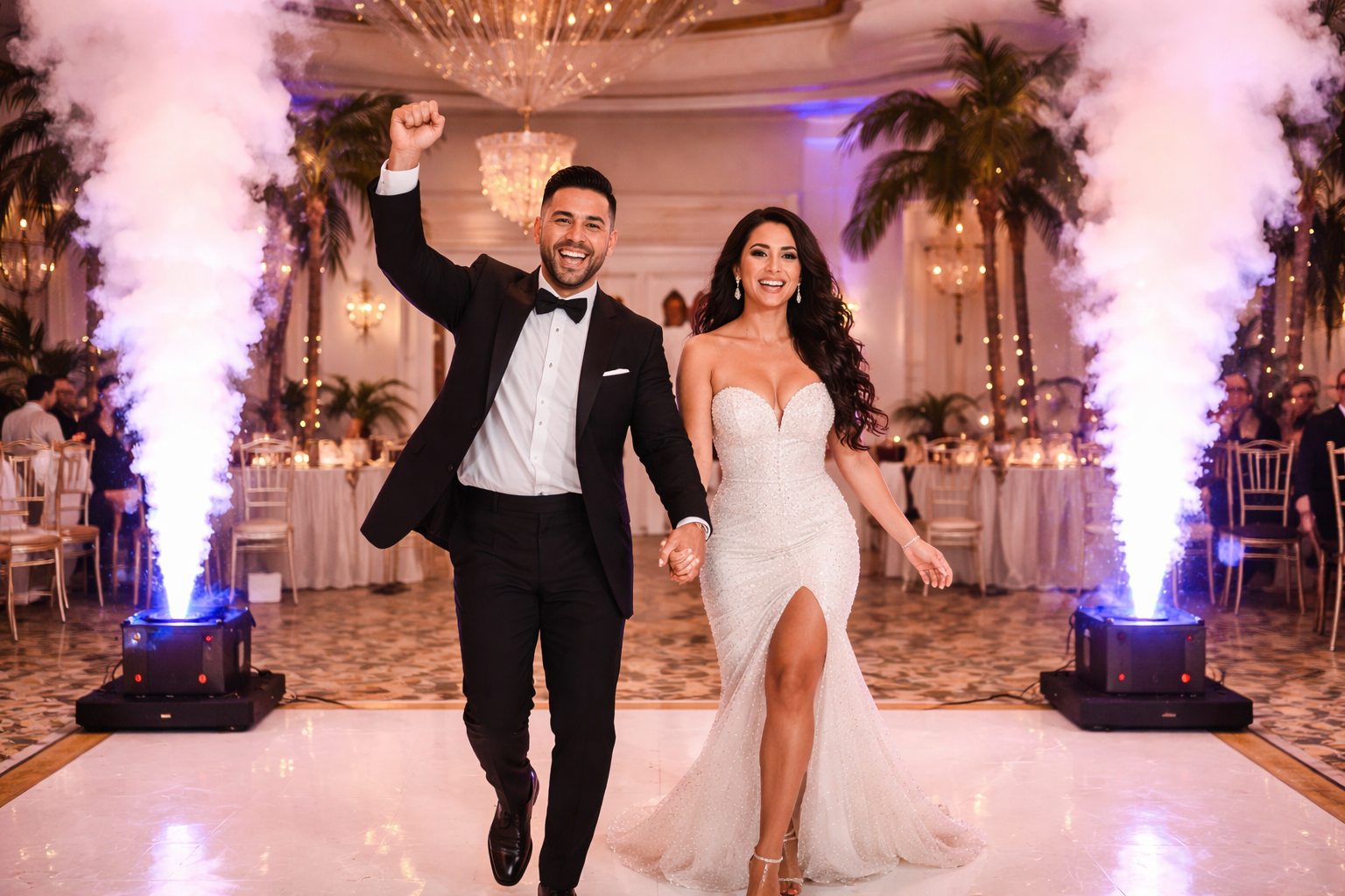 Newlyweds walking hand in hand through a lit wedding reception, surrounded by white flower smoke effects