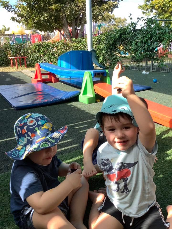 Kids Raising their Hands — Child Care in Bowen, QLD