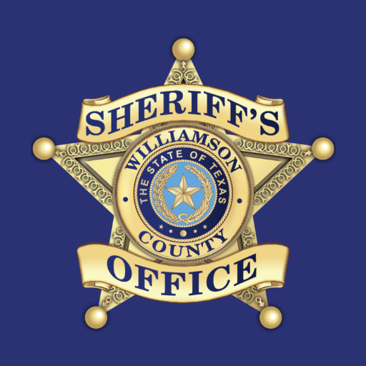 A williamson county sheriff 's office badge on a blue background