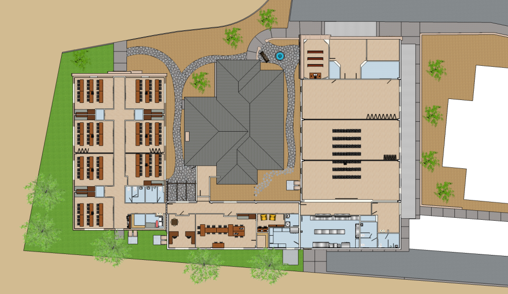 Floor plan of a building with multiple rooms, organized seating areas, and pathways.