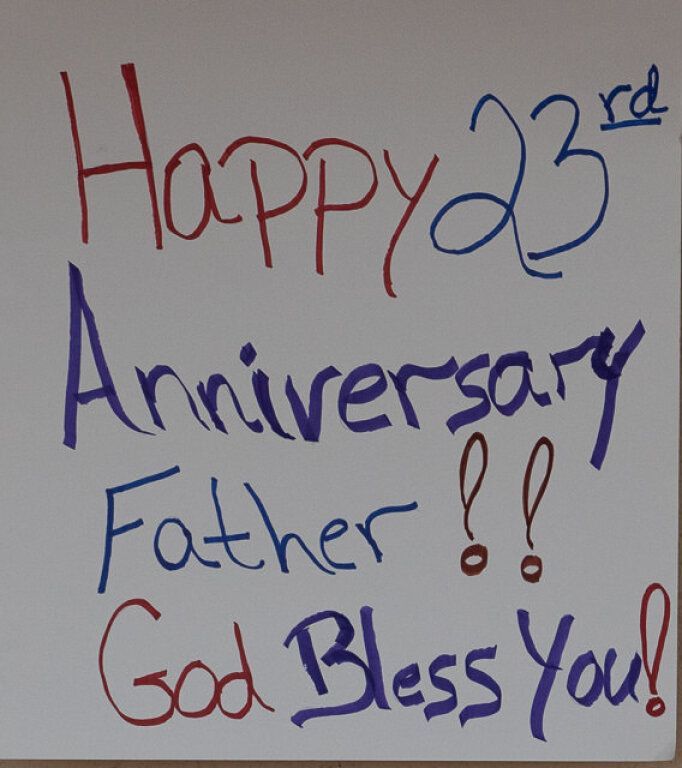 Handwritten message on white poster.