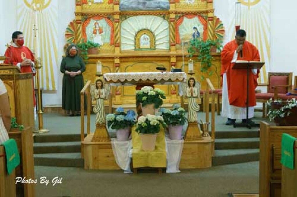 A religious service in a brightly decorated church. 