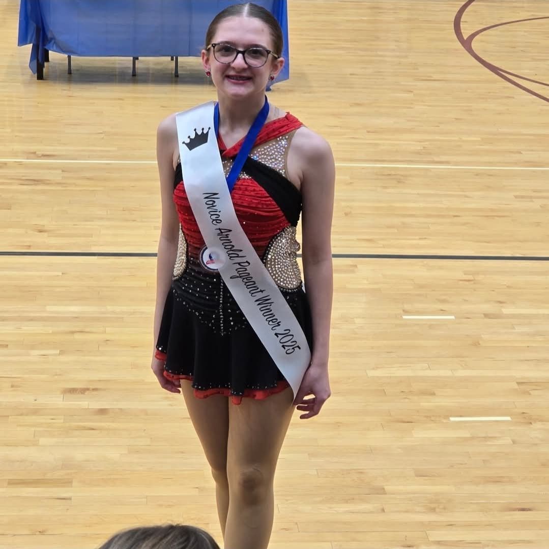 Three girls wearing sashes that say our beautiful middle school twirling 2 fight cancer ambassadors