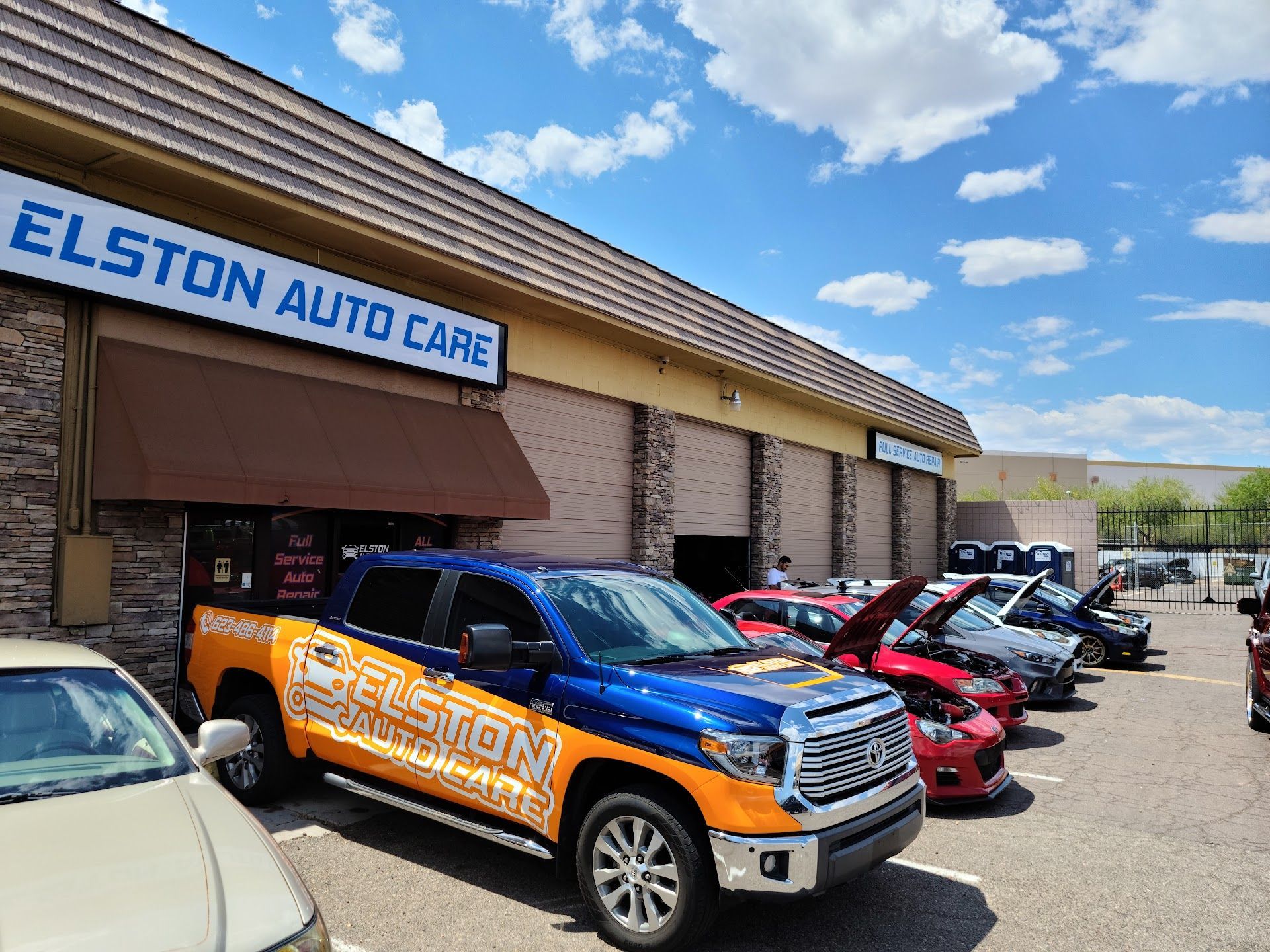 Elston Auto Care Shop Exterior With Company Truck | Elston Auto Care