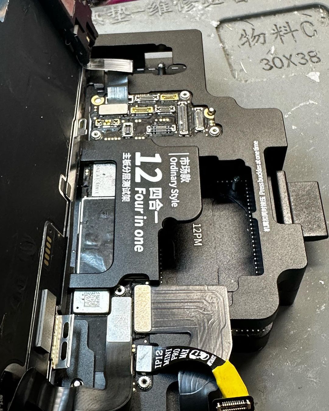 A close up of a tape that says four in one on it