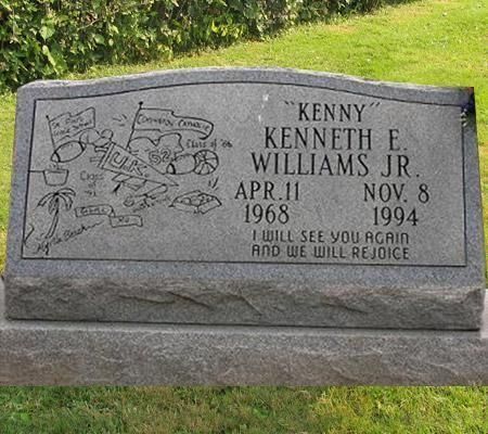 Gray headstone with engraved name 