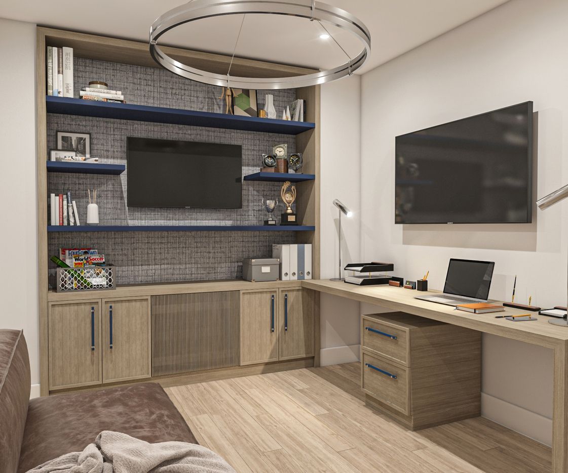 A living room with a couch , desk , television and shelves.