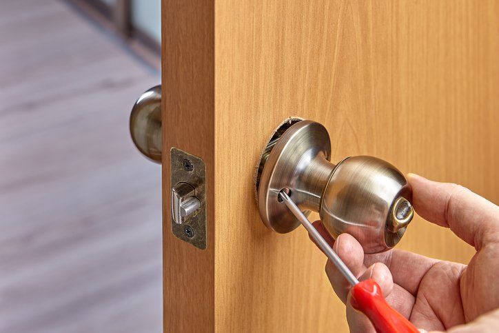 Assembly of lock with handles and latch for an interior door.