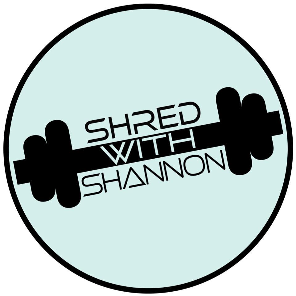A logo for shred with shannon shows a dumbbell in a circle.
