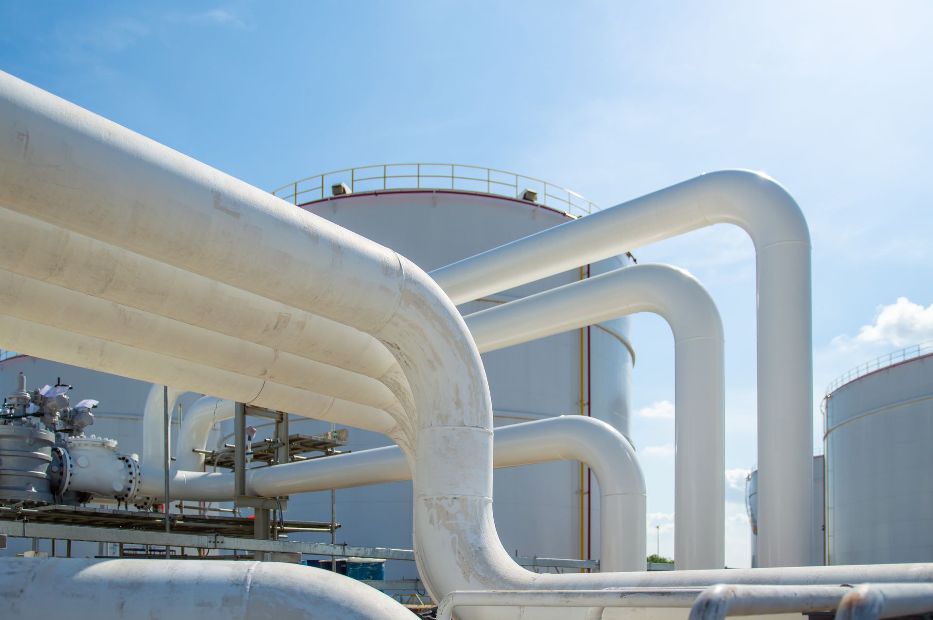 ARM Group Natural Gas Facility Design | tank with pipe delivering natural gas