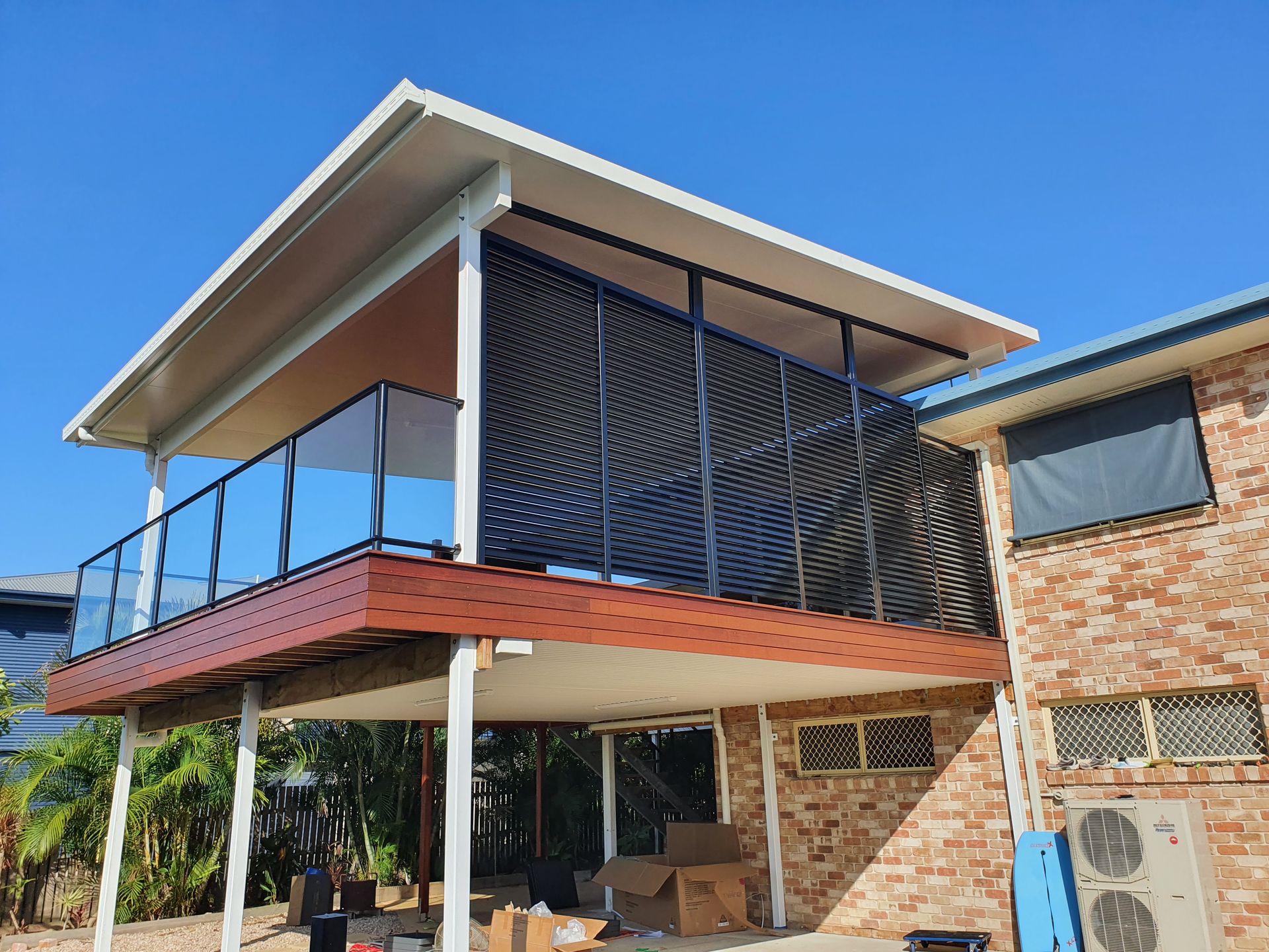 Two-story Deck With Glass Railing — Litzow’s Welding & Fabrication in Dundowran, QLD
