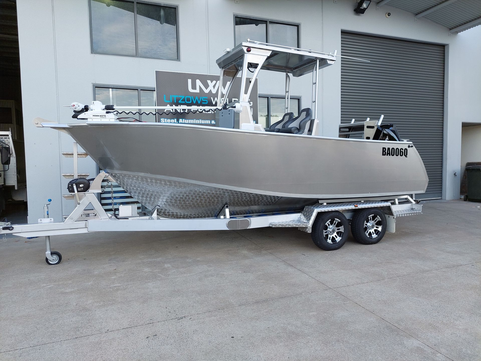 Gray Aluminum Boat on a Trailer — Litzow’s Welding & Fabrication in Dundowran, QLD