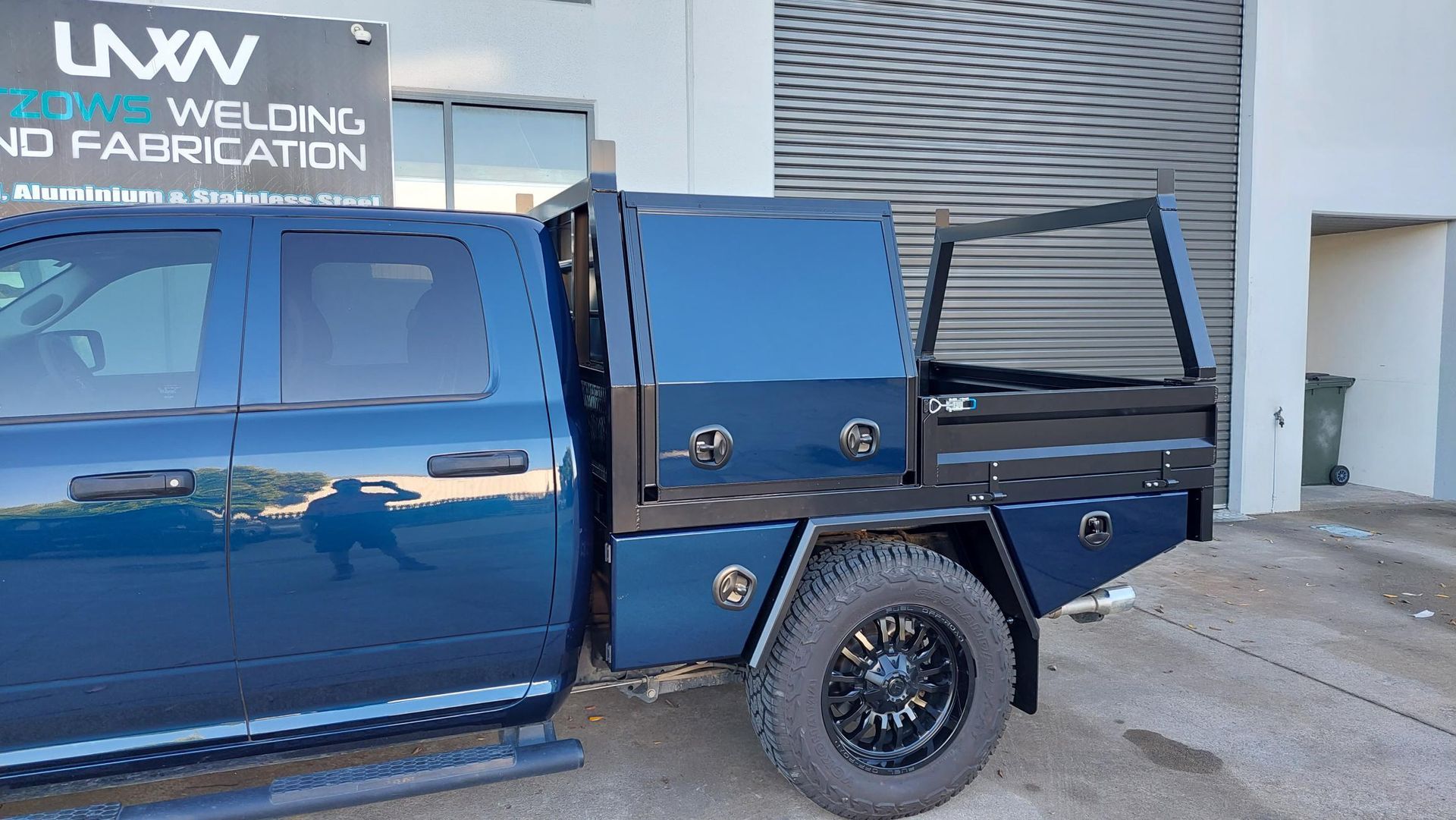 Blue Pickup Truck With a Black Custom Tray — Litzow’s Welding & Fabrication in Dundowran, QLD
