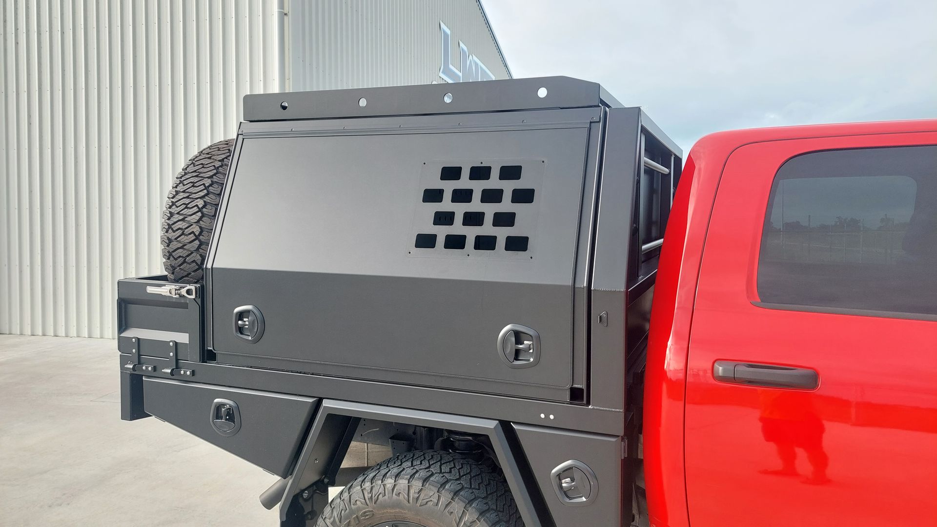 Black Utility Truck Bed With Side Door — Litzow’s Welding & Fabrication in Dundowran, QLD