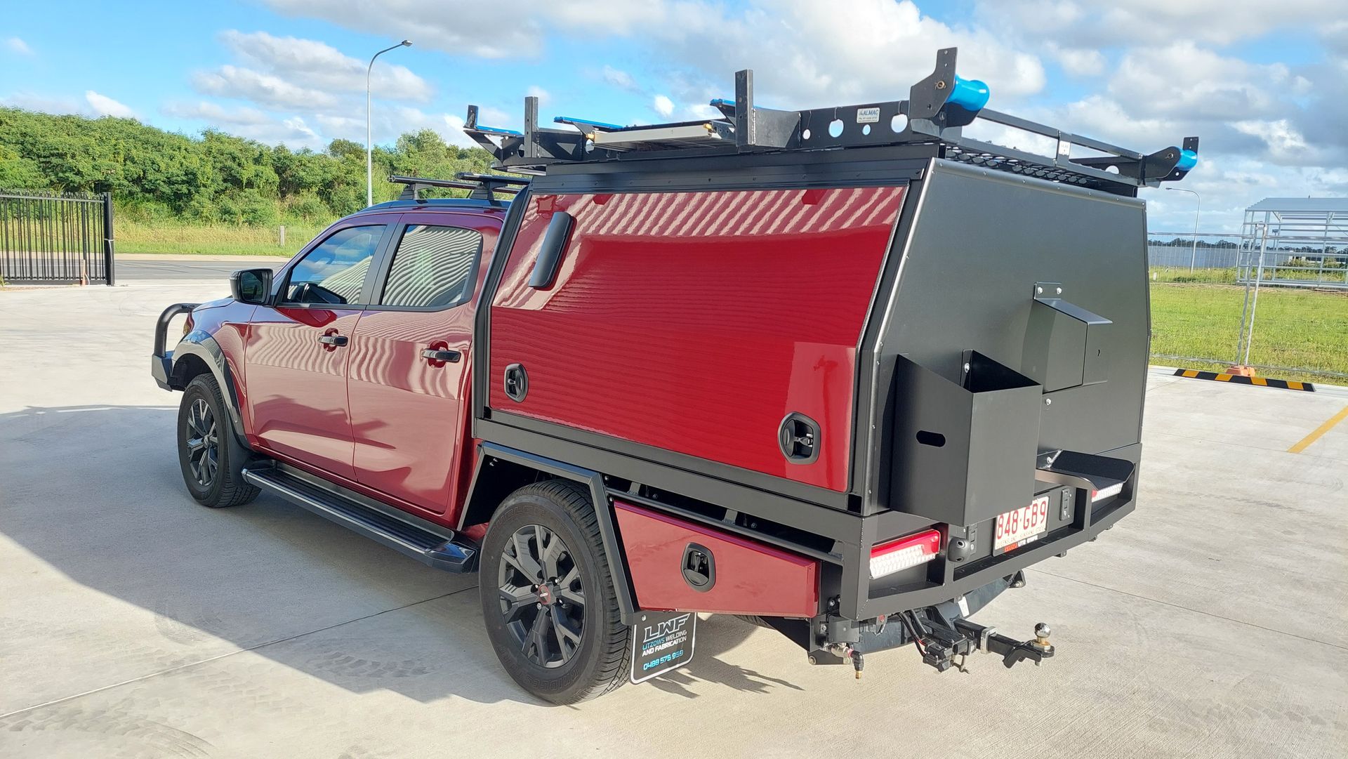 Red Pickup Truck With Black Utility Canopy — Litzow’s Welding & Fabrication in Dundowran, QLD