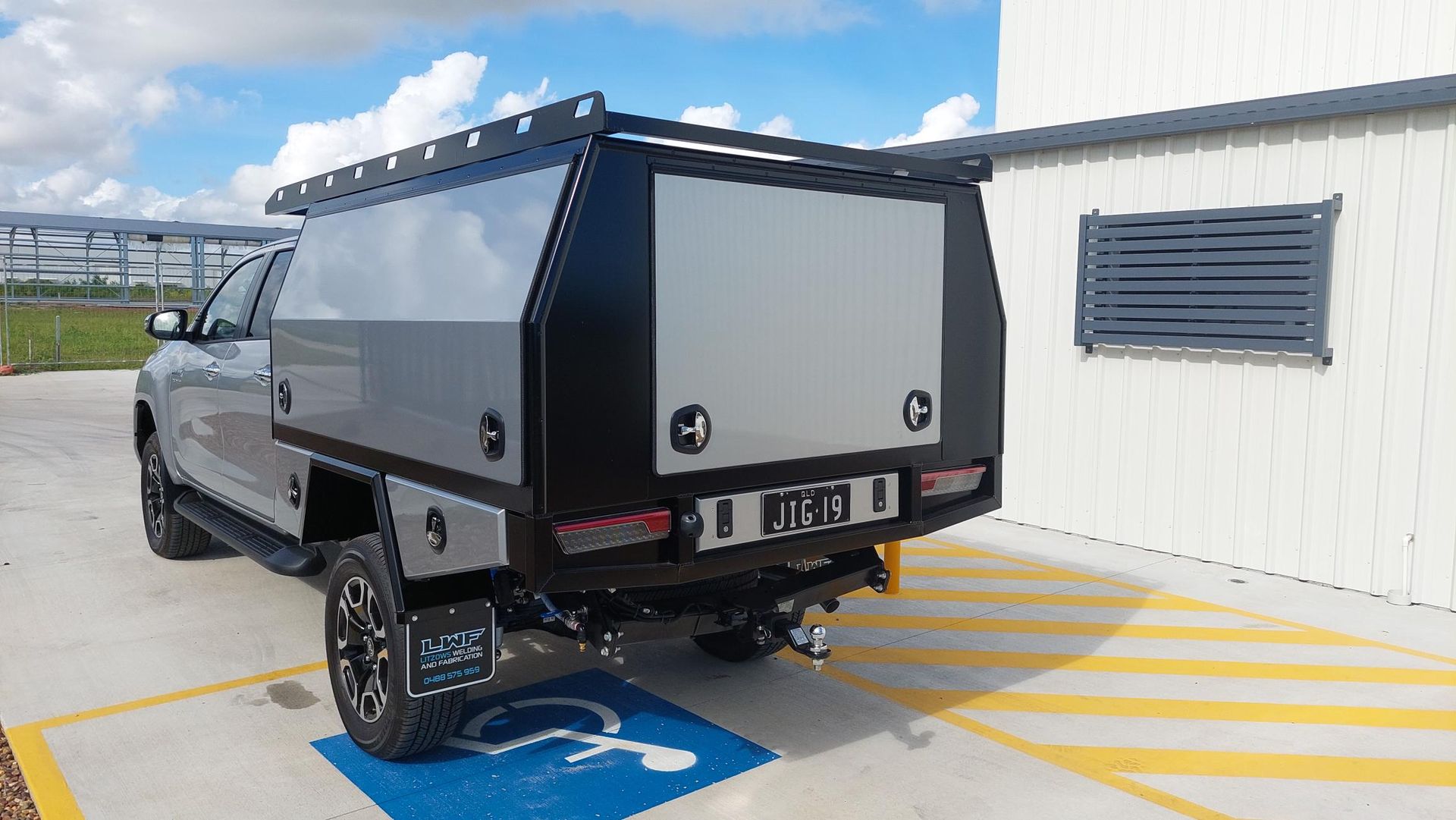 Silver Utility Truck With Black Canopy — Litzow’s Welding & Fabrication in Dundowran, QLD