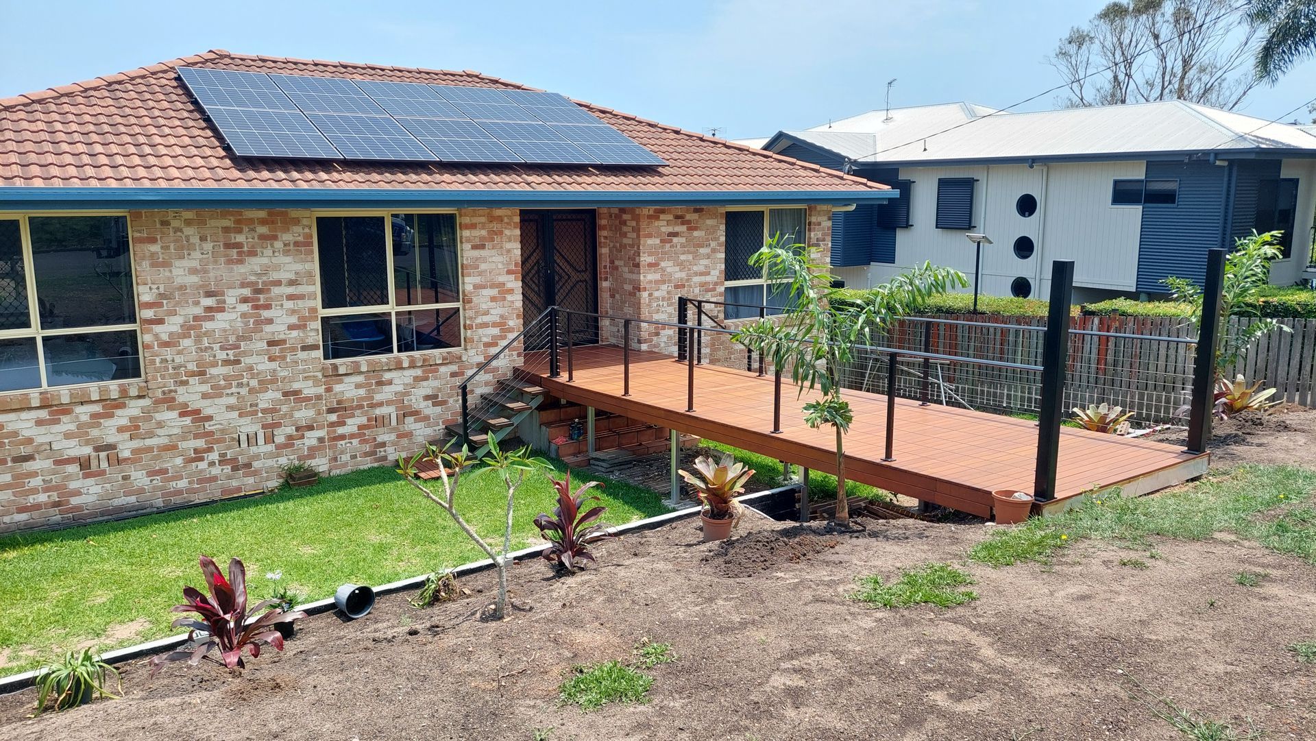 Brick House With Solar Panels — Litzow’s Welding & Fabrication in Dundowran, QLD
