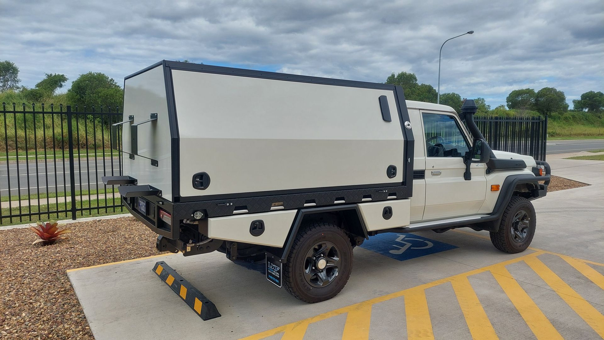 White Pickup Truck With a Utility Canopy Parked — Litzow’s Welding & Fabrication in Dundowran, QLD