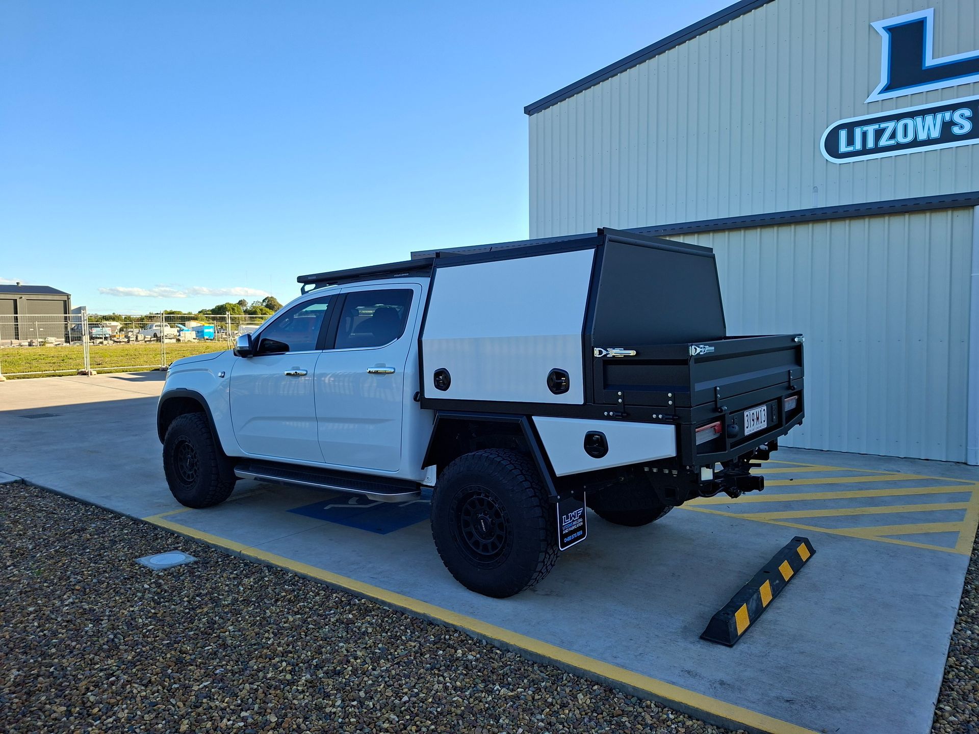 White Pickup Truck With Black Accessories — Litzow’s Welding & Fabrication in Dundowran, QLD