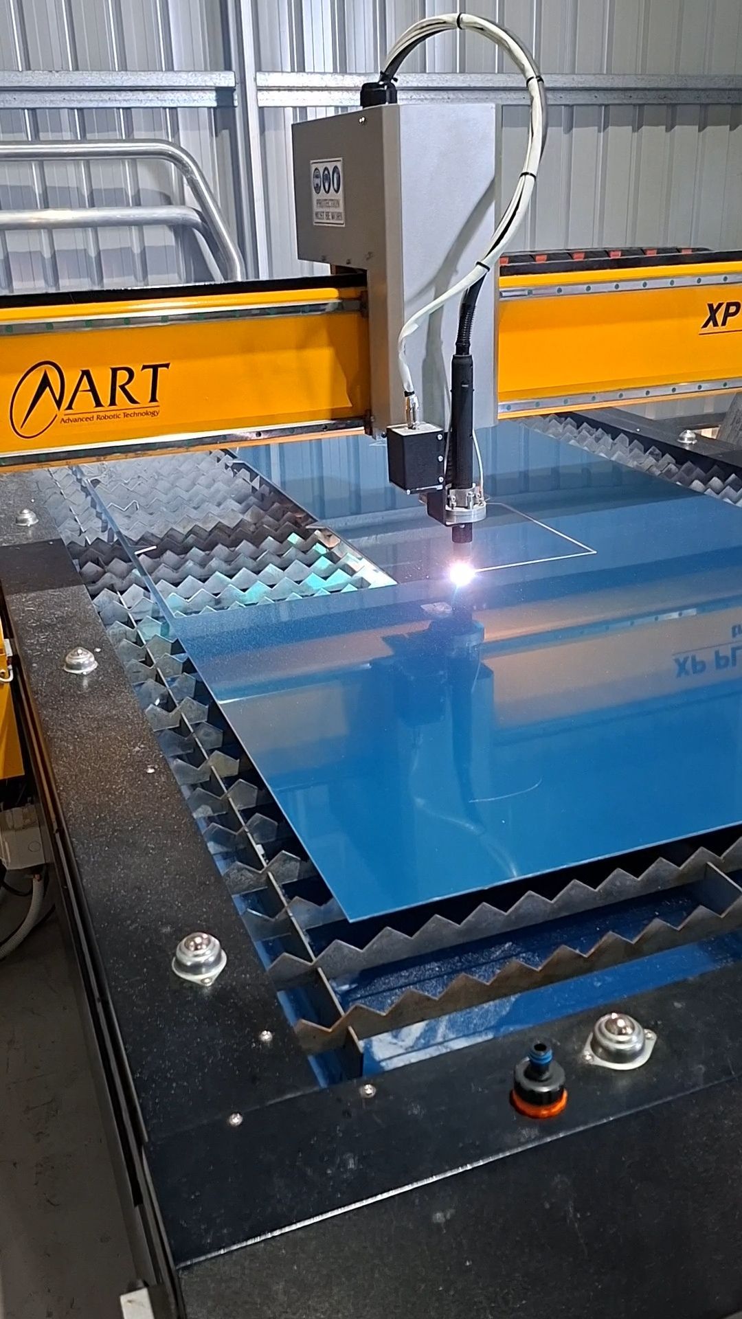 A Metal Sheet Being Cut by a Plasma Cutter — Litzow’s Welding & Fabrication in Dundowran, QLD