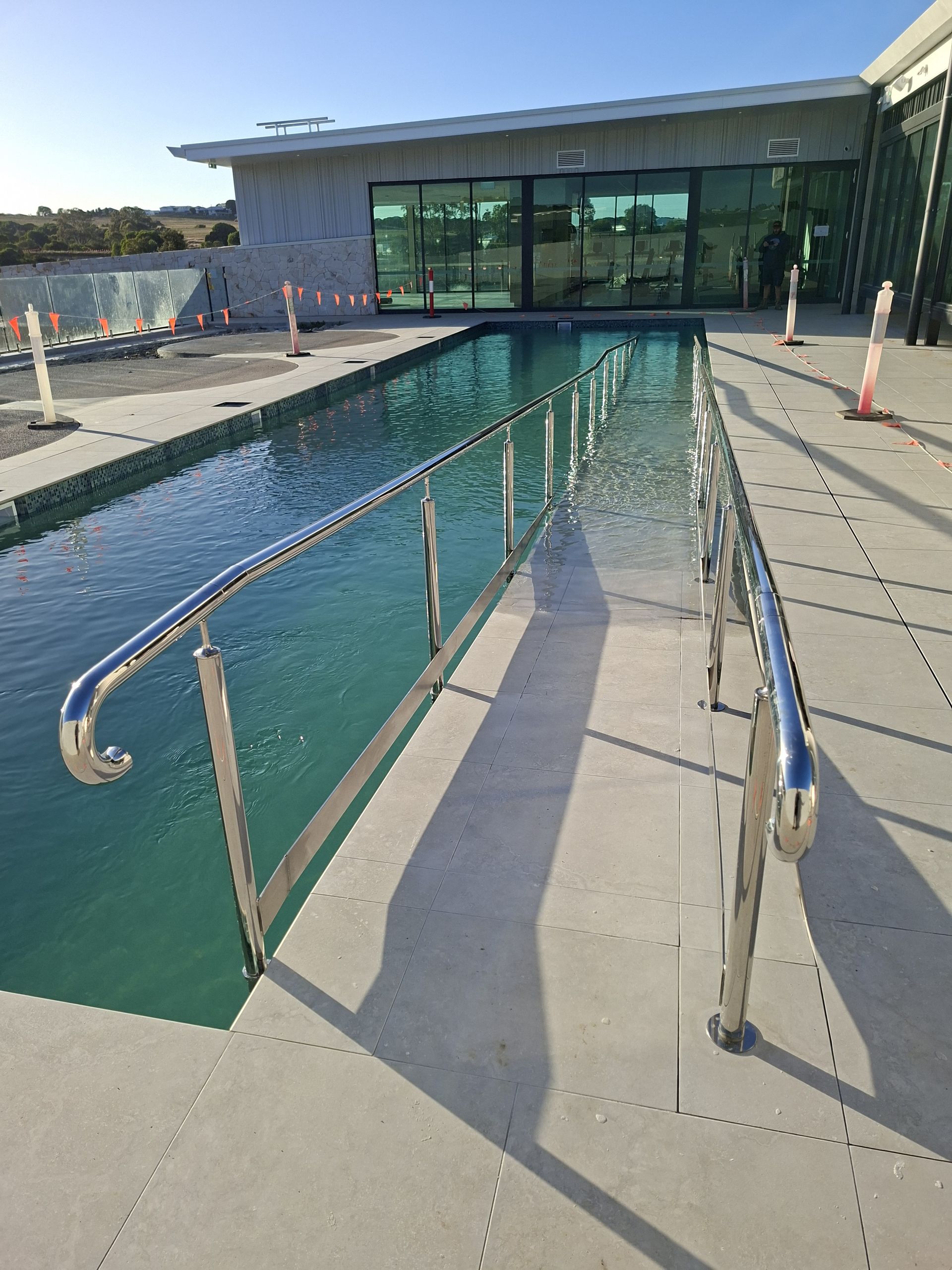 Pool With Stainless Steel Handrails — Litzow’s Welding & Fabrication in Dundowran, QLD