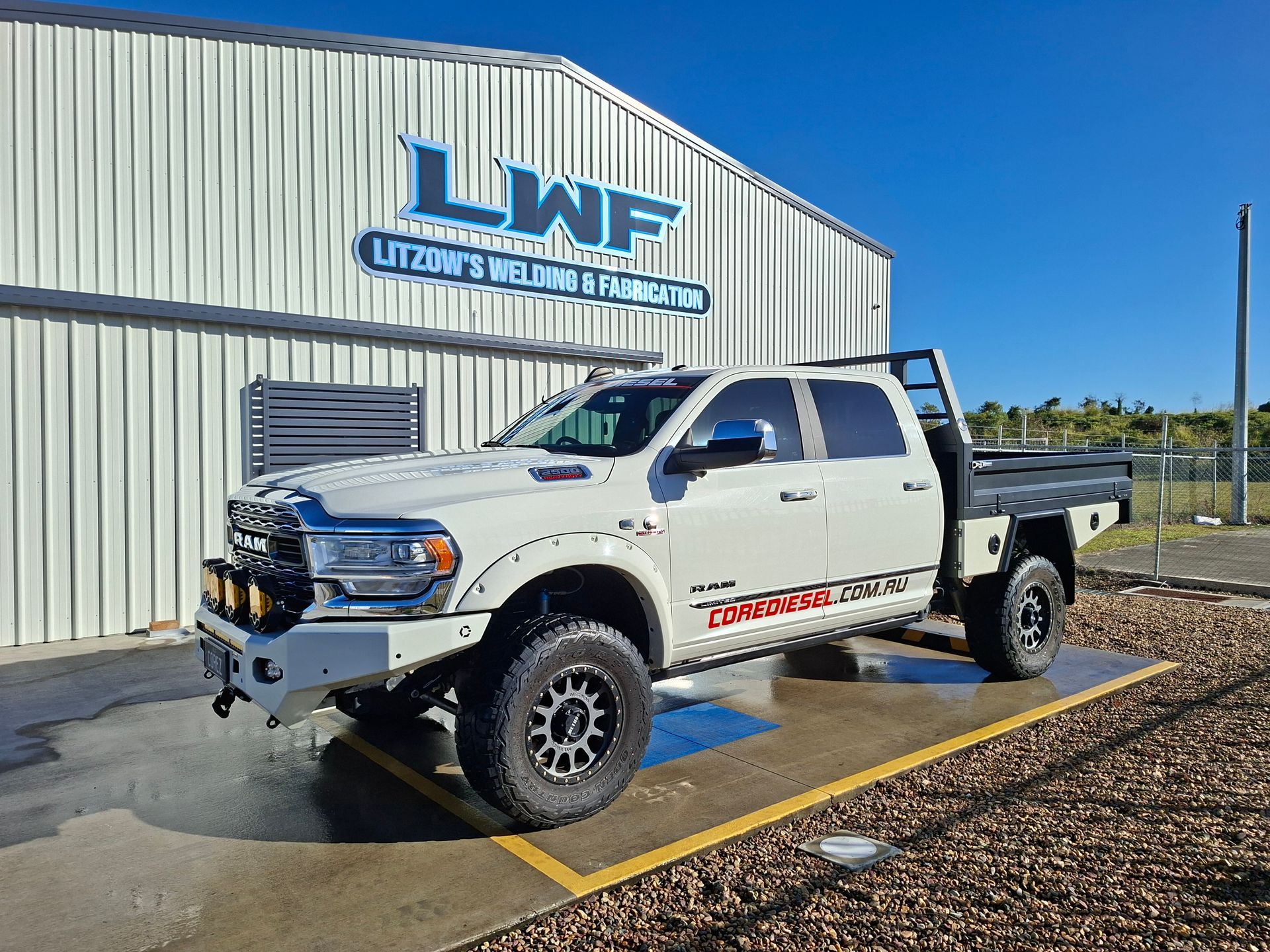 White Ram Truck With Modifications Parked — Litzow’s Welding & Fabrication in Dundowran, QLD