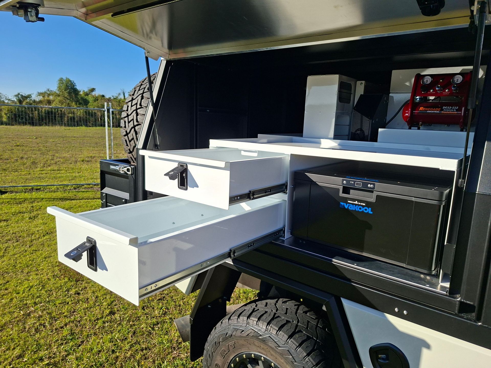 White Storage Drawers in a Black and White Vehicle Camper — Litzow’s Welding & Fabrication in Dundowran, QLD