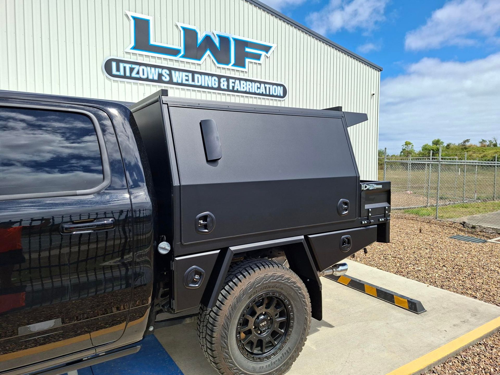 Black Truck With Custom Canopy Parked — Litzow’s Welding & Fabrication in Dundowran, QLD
