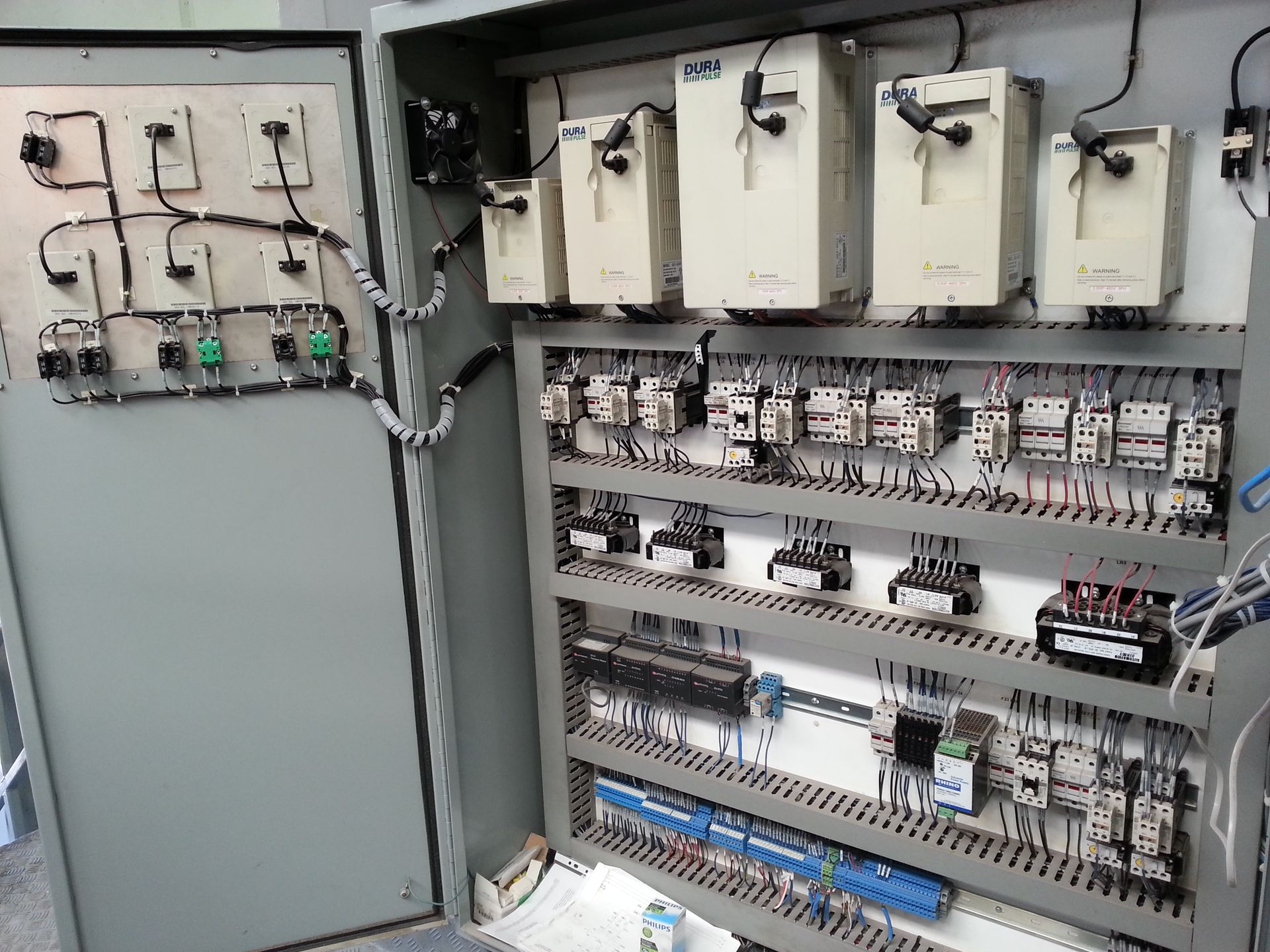 A Factory Filled With Lots of Machinery and a Conveyor Belt — Riselectrical In Currumbin Waters, QLD