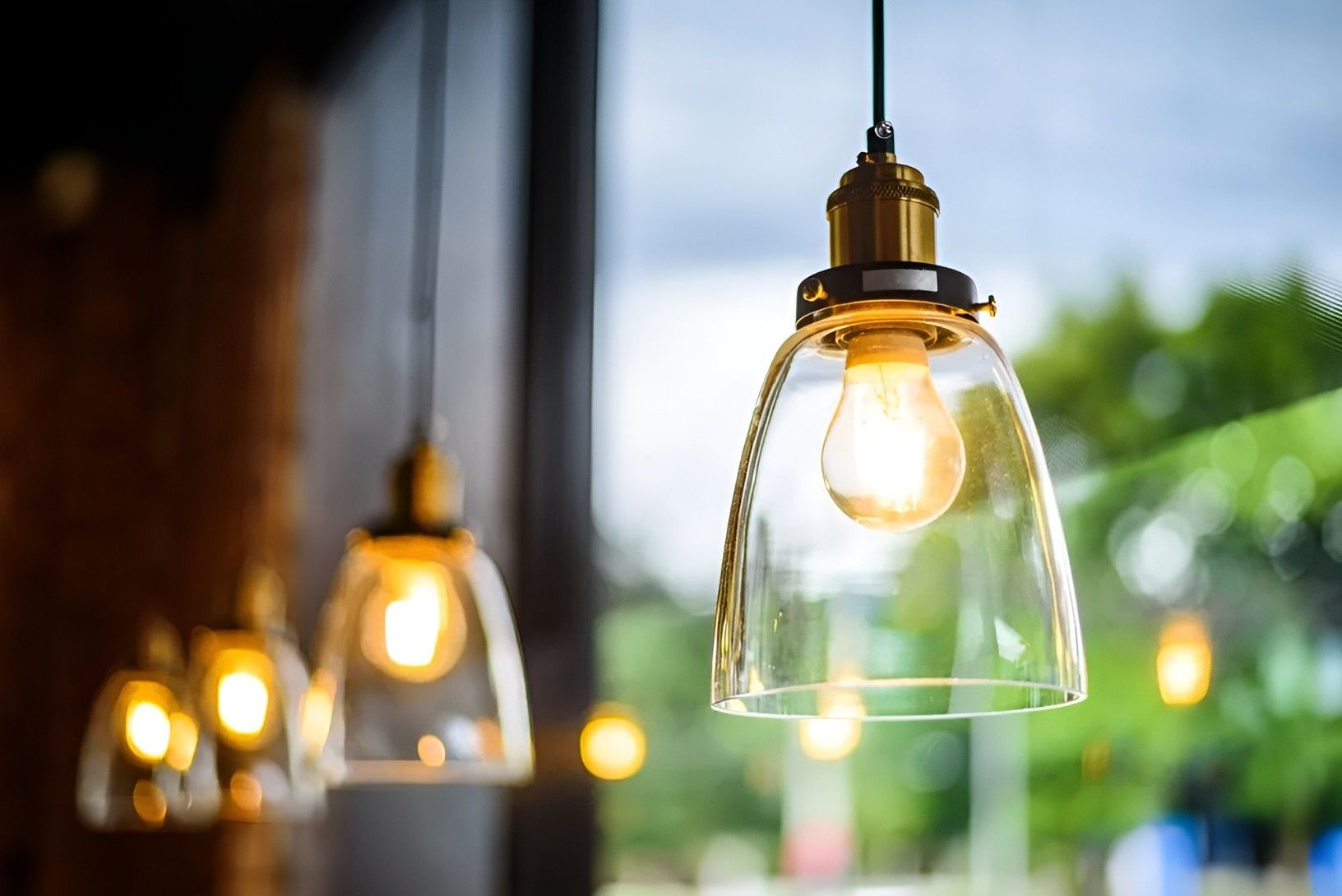 A Close Up of a Pendant Light With a Light Bulb Inside of It — Riselectrical In Currumbin Waters, QLD