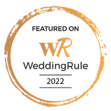 A gold circle with the words `` featured on wedding rule '' written inside of it.